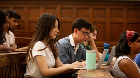 University of Cambridge students listening a lecture in the Student Services Centre old lecture hall. Copyright: University of Cambridge (June 2023)