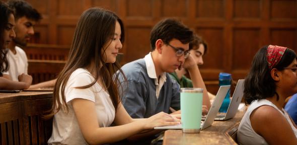 University of Cambridge students listening a lecture in the Student Services Centre old lecture hall. Copyright: University of Cambridge (June 2023)